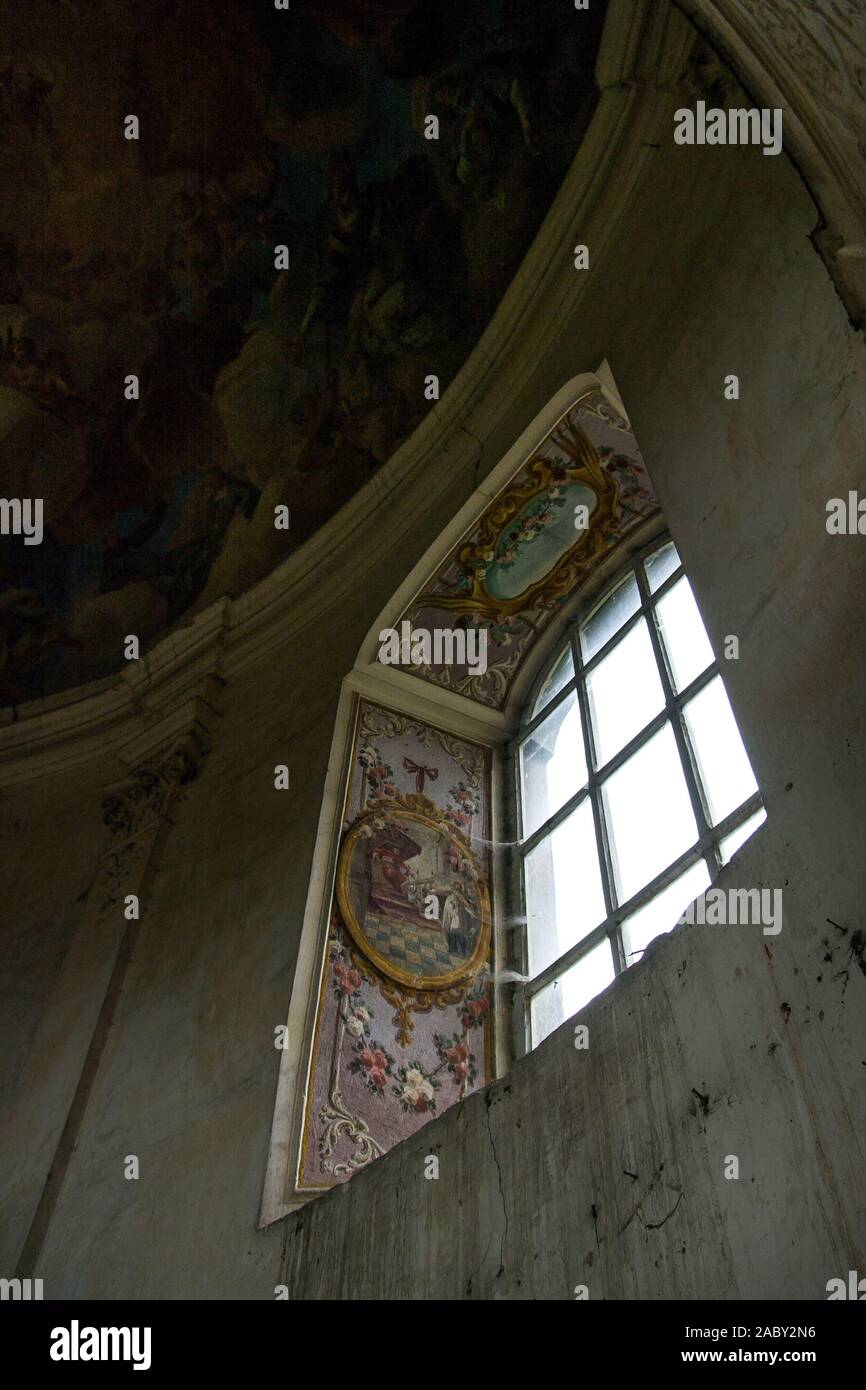 Window polychrome of the chapel in the Sarny Palace built in 1661 in Sarny from the reconstruction of the Renaissance manor, made by the von Götzen fa Stock Photo