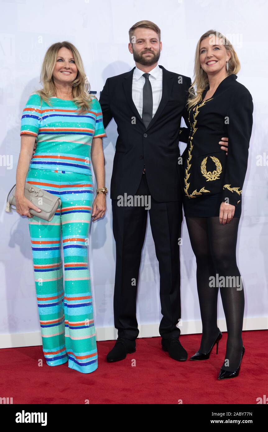 Jewelery and fashion designer Jette JOOP and partner Alexander KINZLER with  presenter Frauke LUDOWIG (L). Red