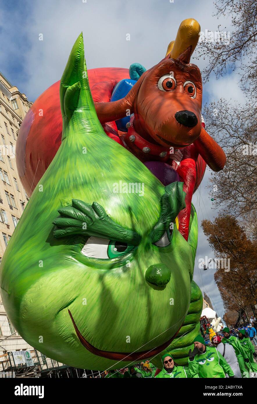 Dr. Seuss The Grinch and dog Max giant balloon flown low because of high  wind at 93rd Annual Macy's Thanksgiving Day Parade alone Central Park West  (Photo by Lev Radin/Pacific Press Stock