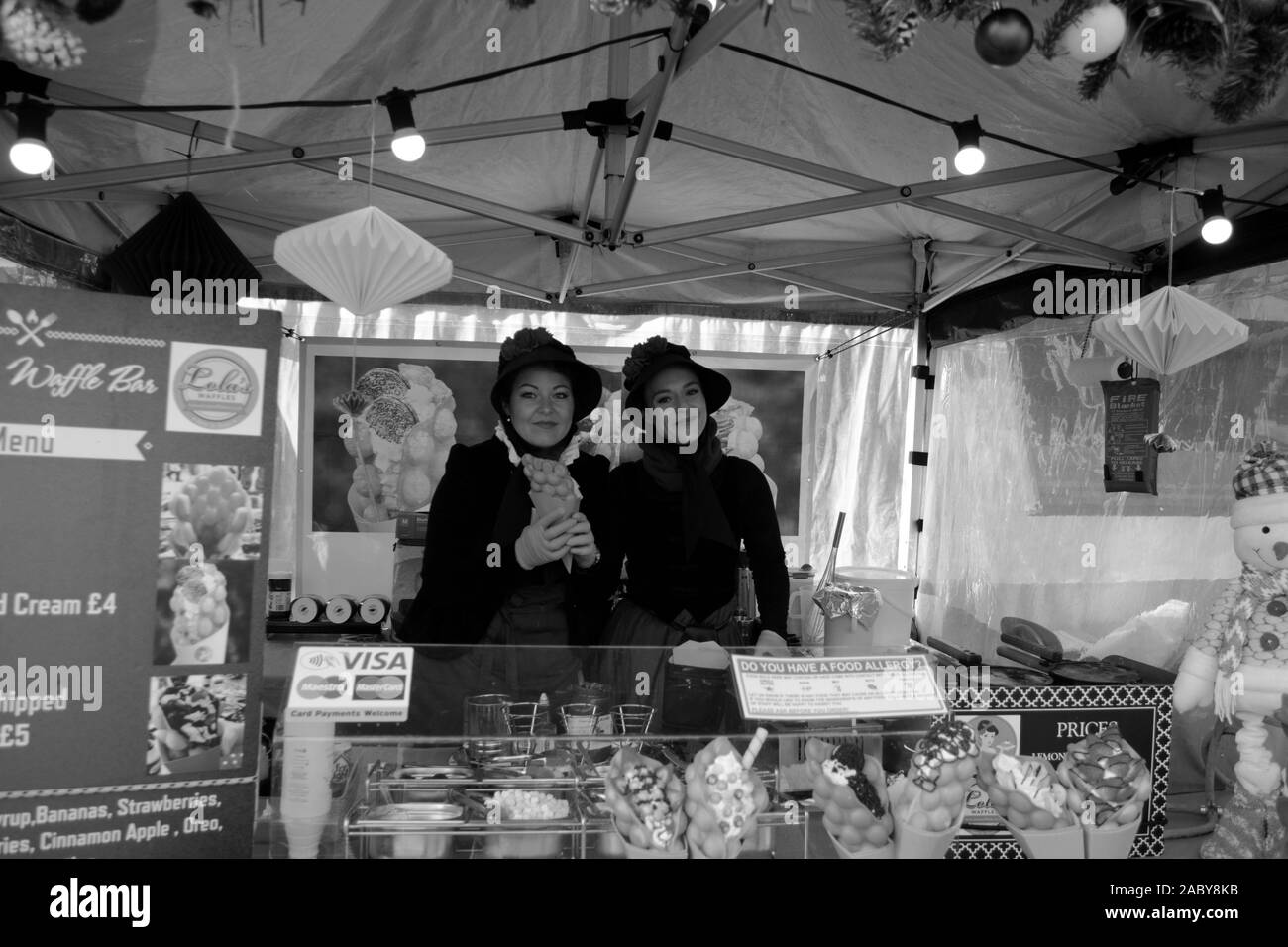 Worcester Victorian Christmas Market. Worcester City, Worcestershire, United Kingdom, 29/11/2019, , The stall holders pose for a victorian photo aroun Stock Photo