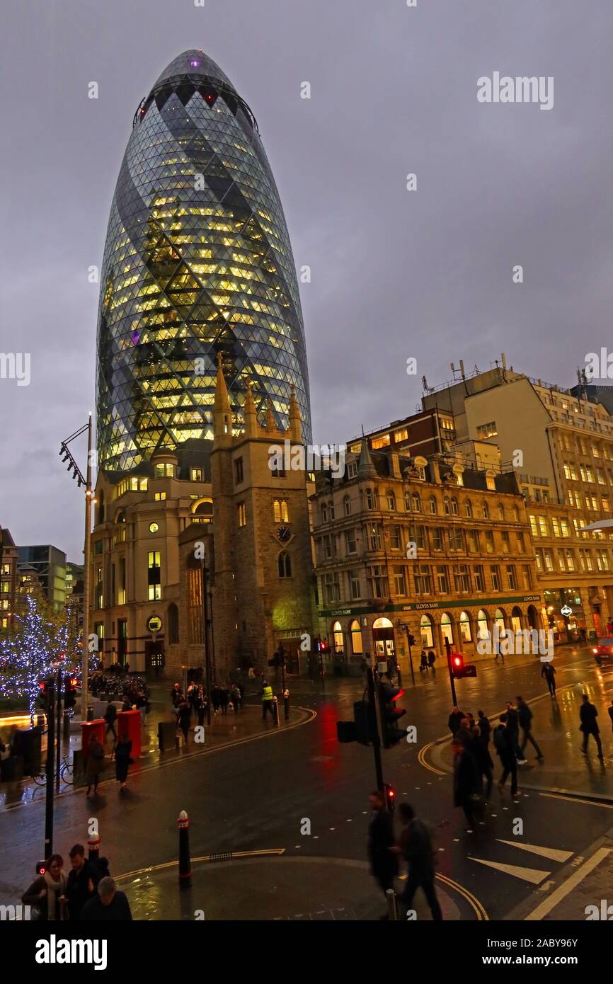 St Andrew Undershaft, with St Mary Axe/Gherkin, in background, at dusk,St Mary Axe, London,England,UK, EC3A 8BN Stock Photo