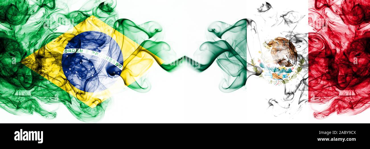 Brazil, Brazilian vs Mexico, Mexican smoky mystic flags placed side by side. Thick colored silky abstract smoke flags combination Stock Photo