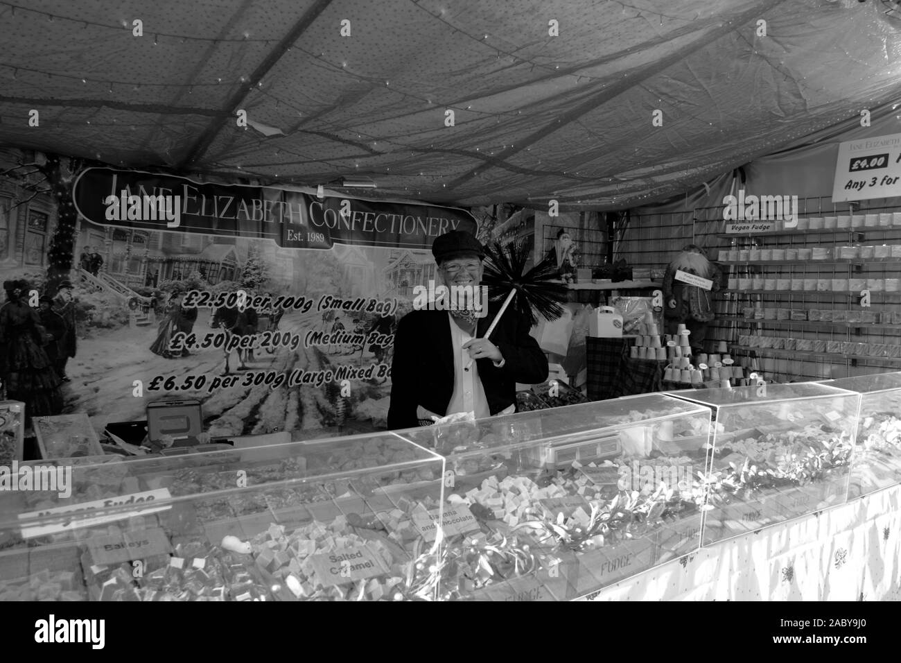 Worcester Victorian Christmas Market. Worcester City, Worcestershire, United Kingdom, 29/11/2019, , The stall holders pose for a victorian photo aroun Stock Photo