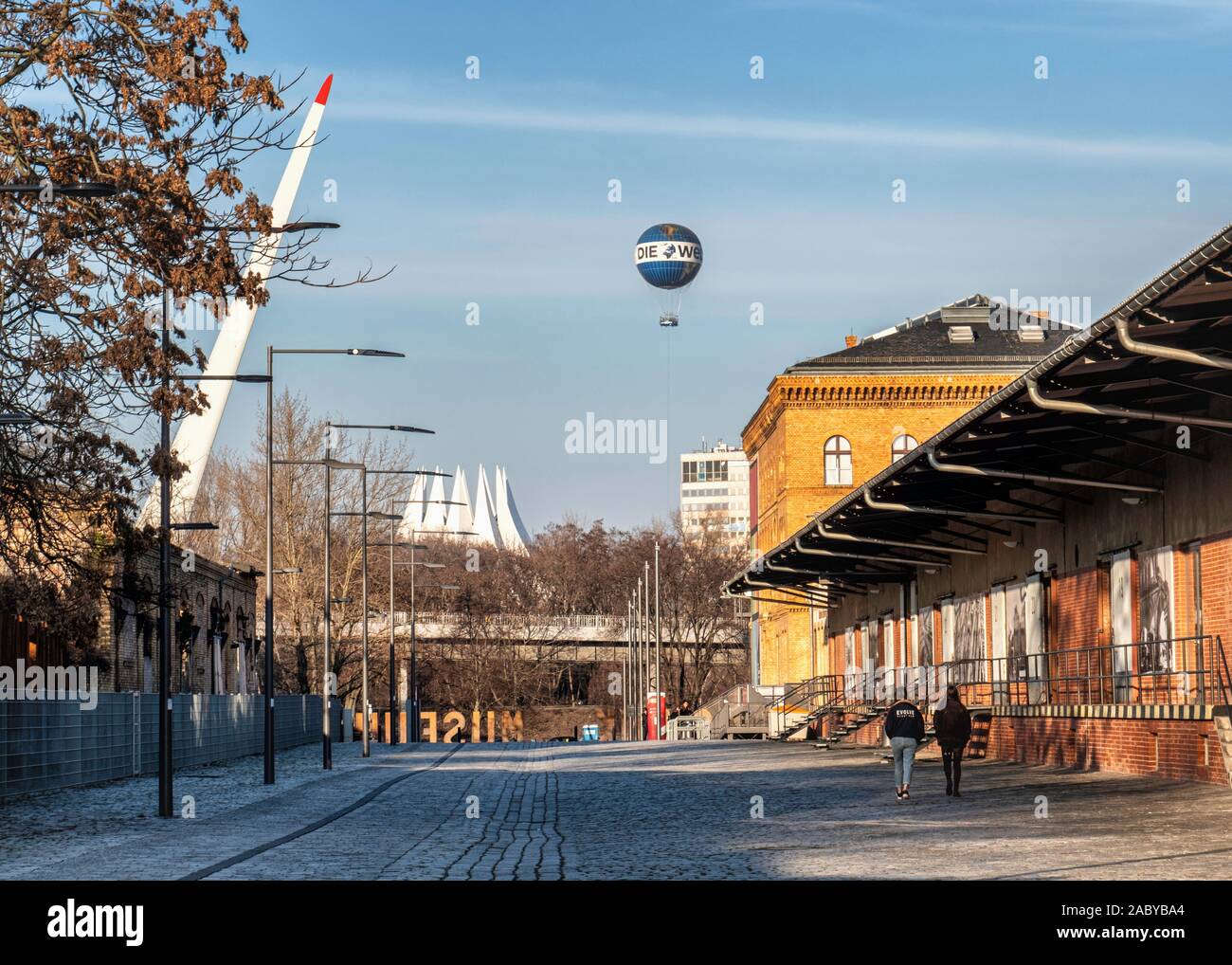 Wind Turbine blade, hot air balloon & Old freight yard buildings in grounds of German Museum of Science & Technology in Kreuzberg, Berlin. Stock Photo