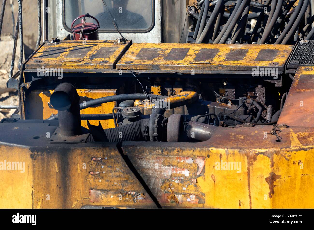 Black smoking exhaust pipe of excavator with dirty engine Stock Photo