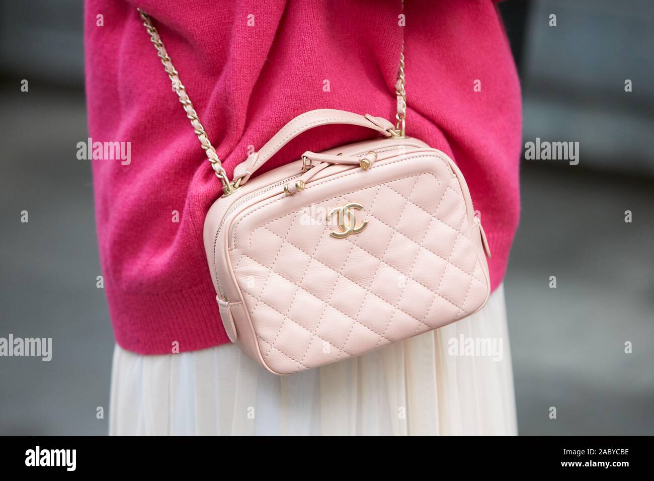 Woman with Pink Chanel Leather Bag before Jil Sander Fashion Show