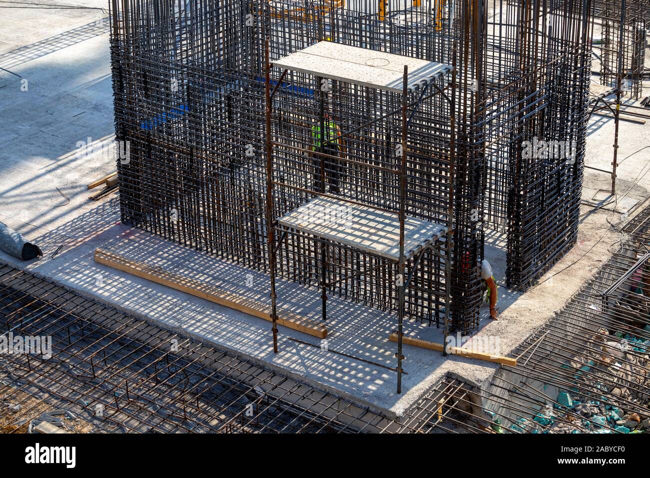 Building site with rebar foundation. Reinforcement concrete bars with wire rod  at construction site. Stock Photo