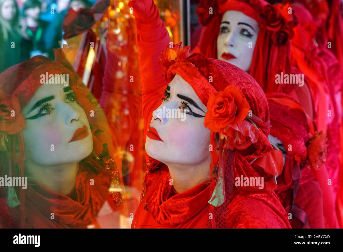 The Extinction Rebellion Red Brigade protesting on Black Friday on Oxford Street in London, England, United Kingdom, UK Stock Photo