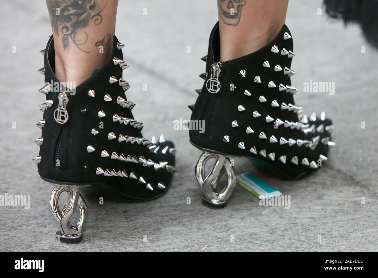 MILAN, ITALY - SEPTEMBER 19, 2019: Woman with black Laura Biagiotti shoes  with silver studs and heel before Emporio Armani fashion show, Milan  Fashion Stock Photo - Alamy