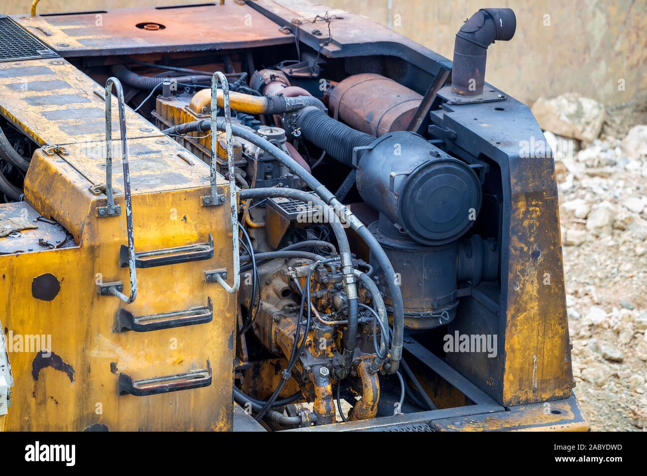 Excavator with dirty engine and smoking exhaust pipe Stock Photo Alamy