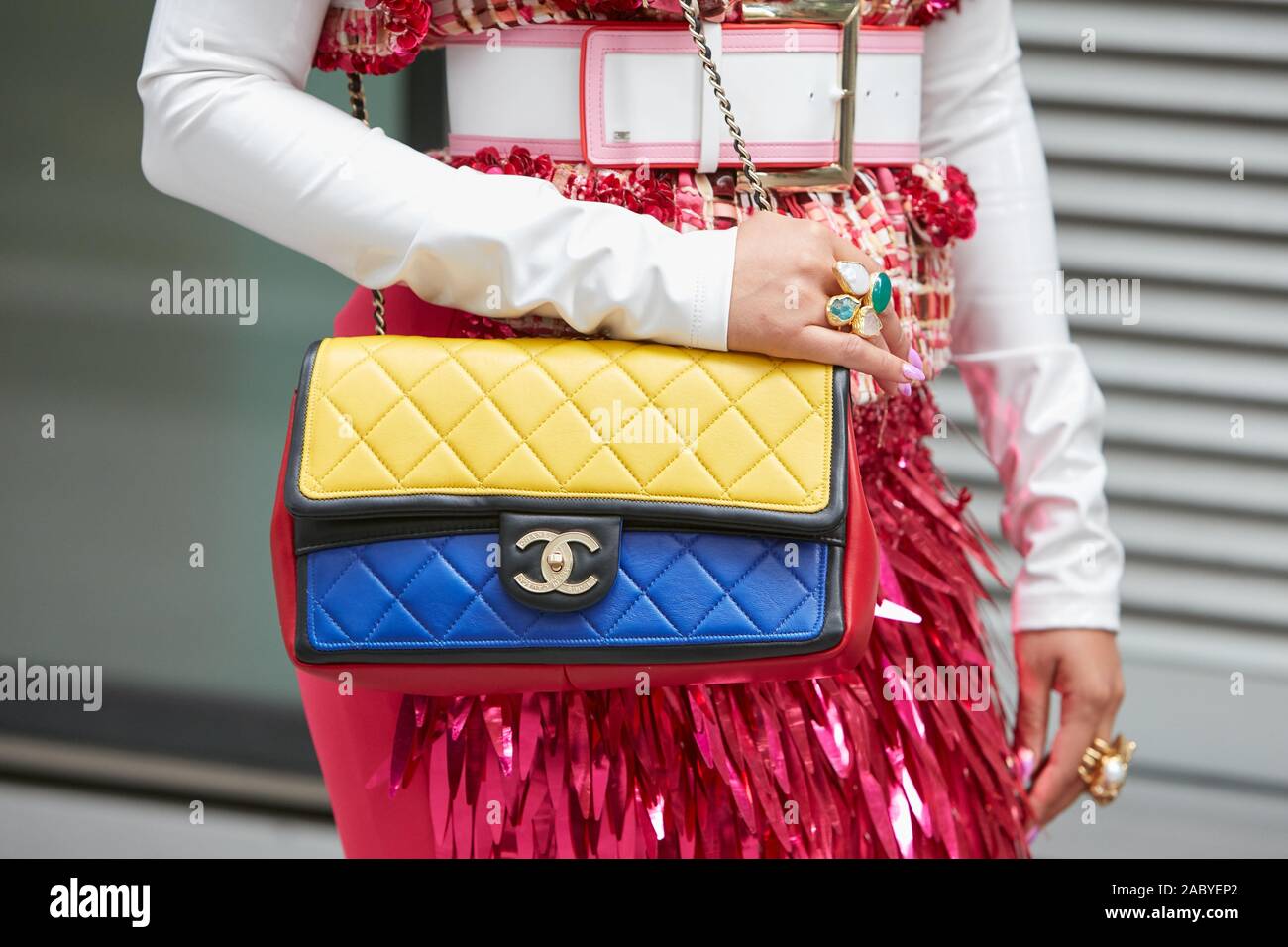Woman with Red Chanel Leather Bag and Yellow Jacket before Max
