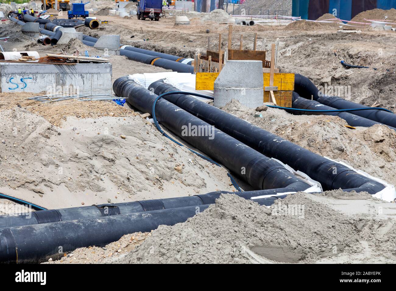 Leveling insulated pipes for underground district heating. Connecting a