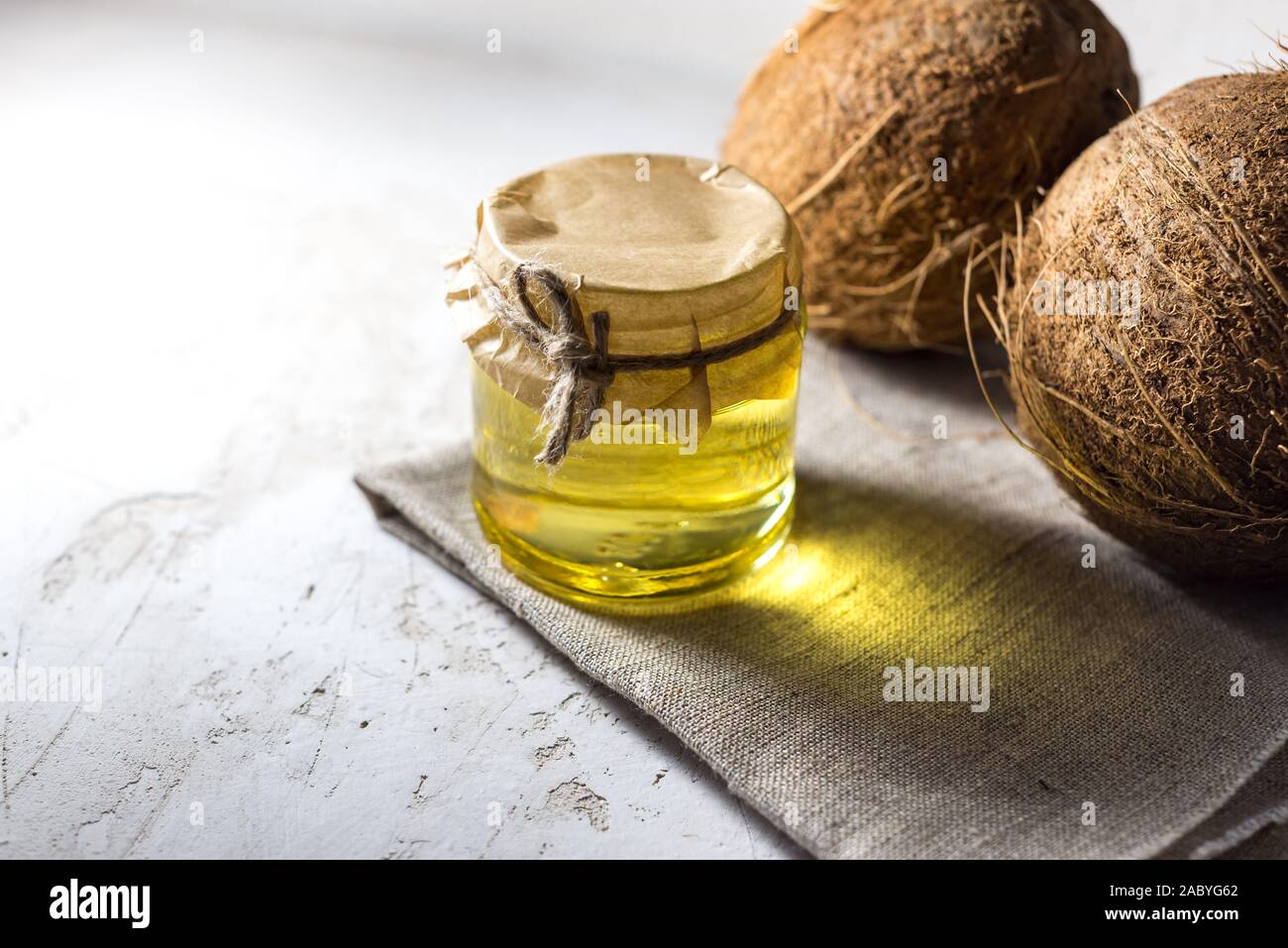coconut and bottle of coconut palm oil. healthy food vegan aromatherapy concept Stock Photo Alamy