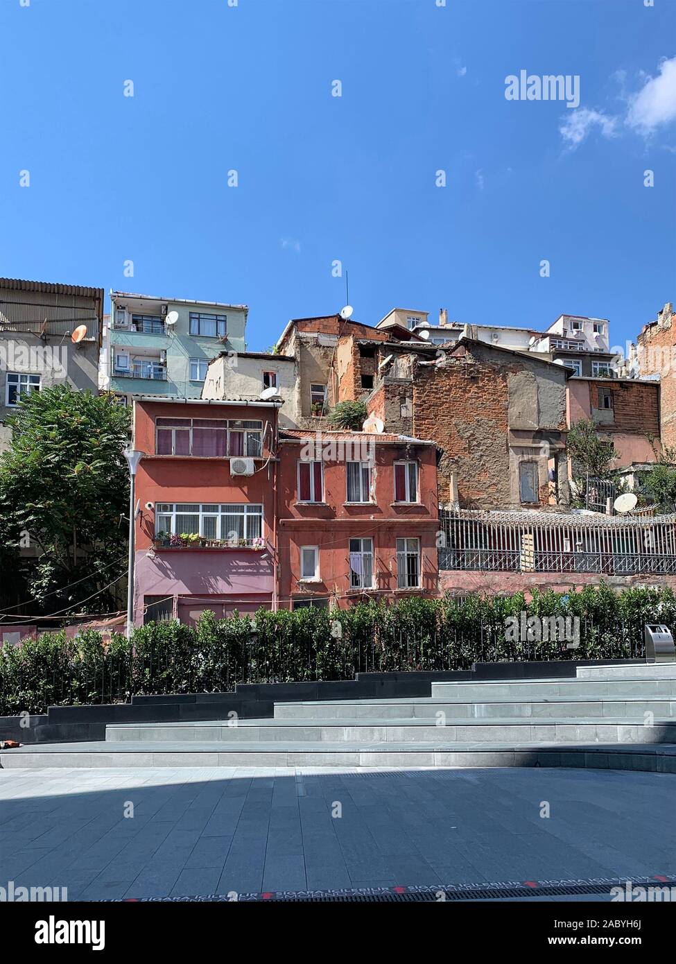 View of old buildings in Dolapdere area of Istanbul. It is a sunny summer day. Stock Photo
