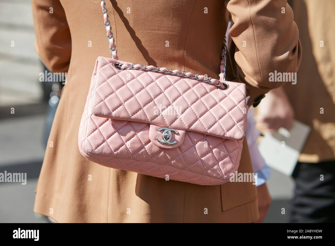 MILAN, ITALY - SEPTEMBER 19, 2019: Woman with pink leather Chanel bag  before Genny fashion show, Milan Fashion Week street style Stock Photo -  Alamy