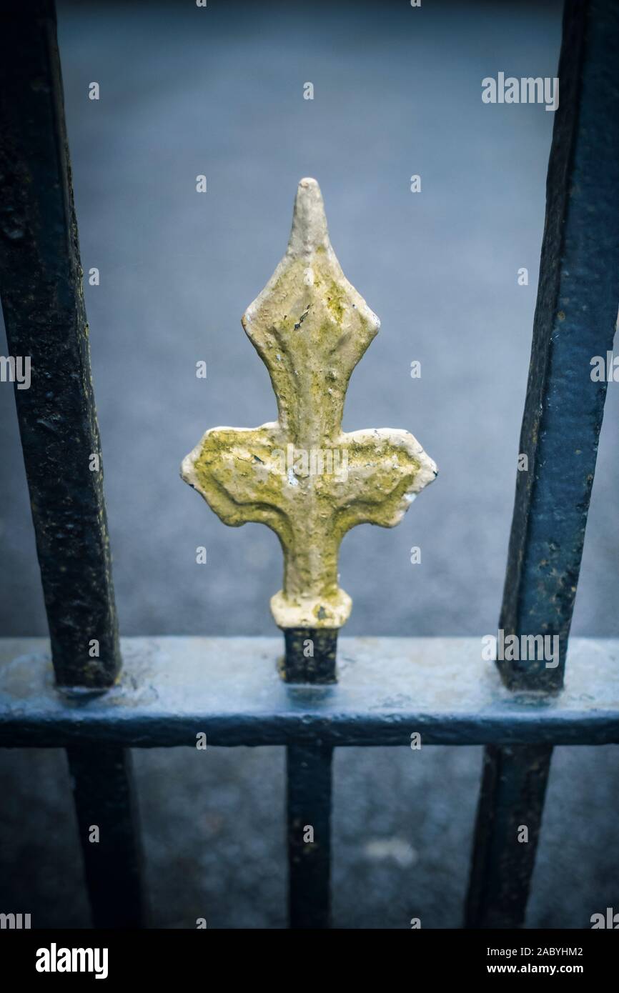 A gold painted finial on a cast iron gate at a church near Consett, County Durham, England, UK Stock Photo