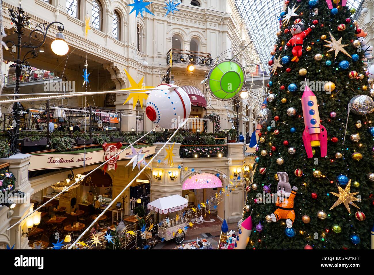 Moscow, Russia - November 25, 2019: New Year tree with cartoon toys in the  State Department Store on Red Square. Christmas in the center of Moscow.  Design on a space theme Stock Photo - Alamy