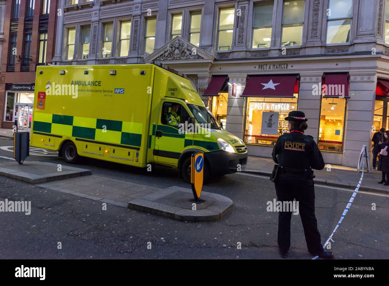 London Bridge, London, UK. 29th Nov, 2019. Police have cordoned off a large area around London Bridge after a stabbing incident and gunfire. Ambulance leaving the scene. People are being moved away from the area Stock Photo