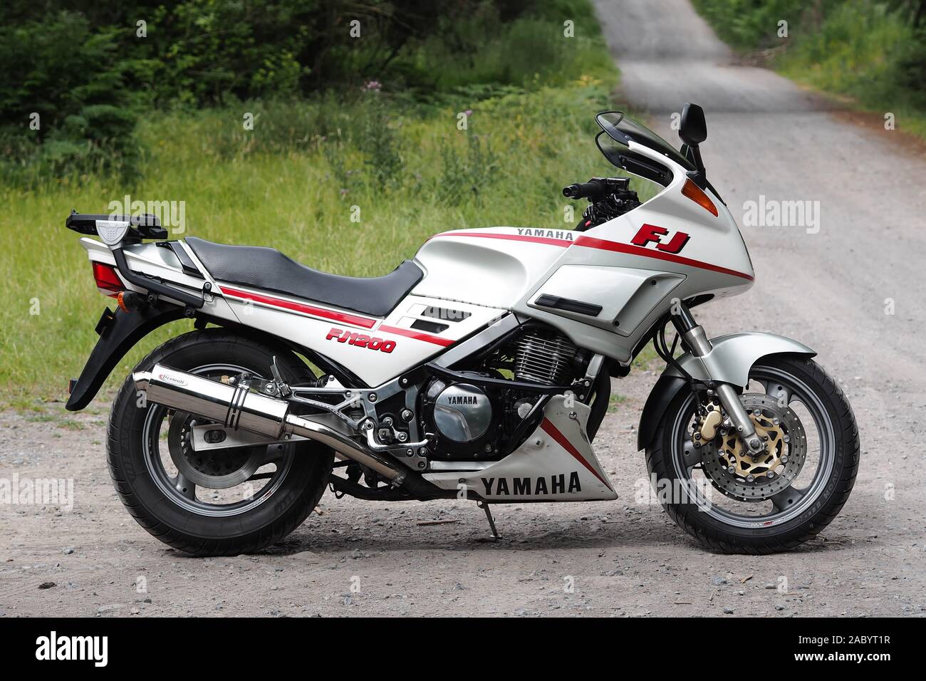 Yamaha FJ1200 sports touring motorcycle parked on woodland road. Tipperary, Ireland Stock Photo