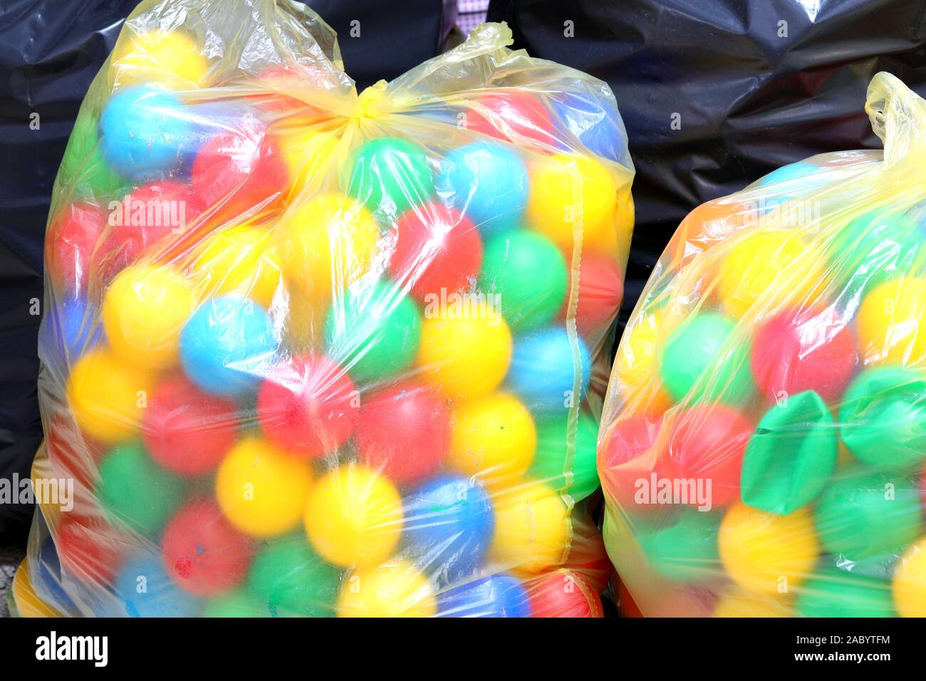 two big bags with plastic recyclable balls in the recycling center
