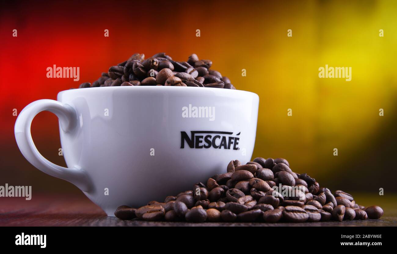 LONDON, UK - AUGUST 15, 2019: Pack of Nescafe Gold Cappuccino with coffee  beans and sugar cubes on light background Stock Photo - Alamy