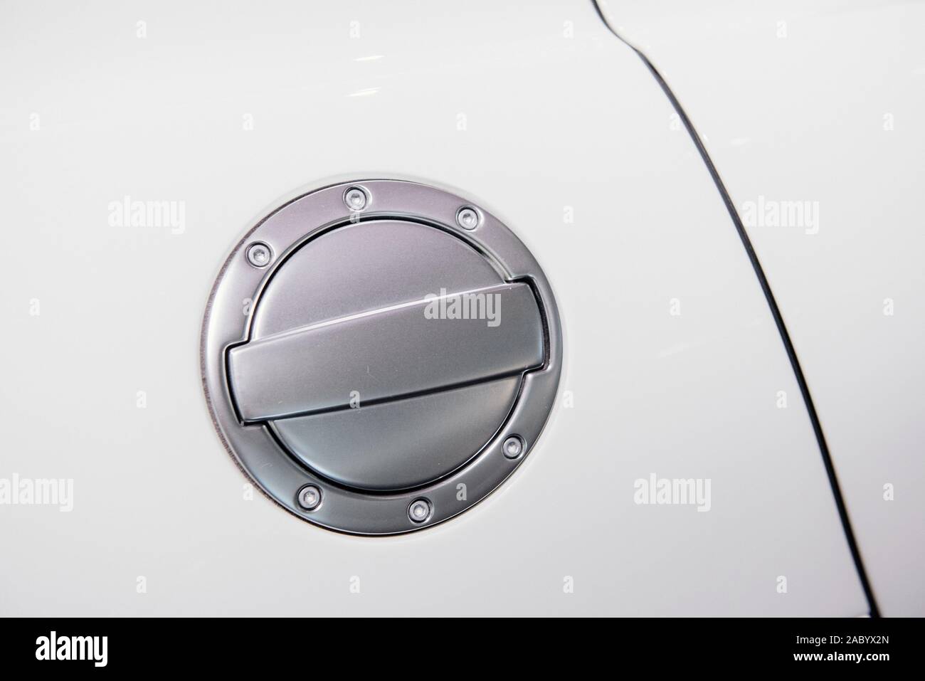 Close up shot of chrome fuel tank cover or gas filler cap of white