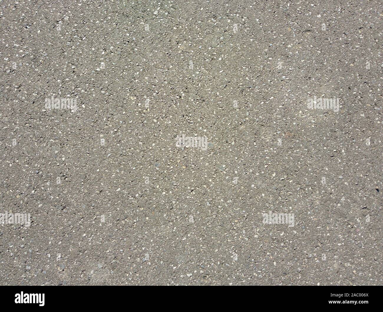 Asphalt texture background, close up, sunny day - top view Stock Photo