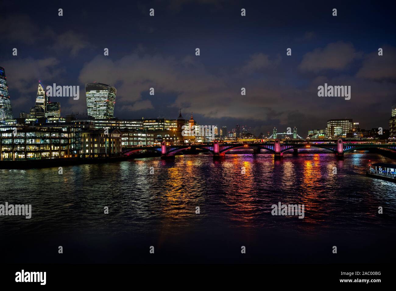 City of London England at night showing Tower Bridge and the Walkie Talkie building at dusk. Nov 2019 Stock Photo