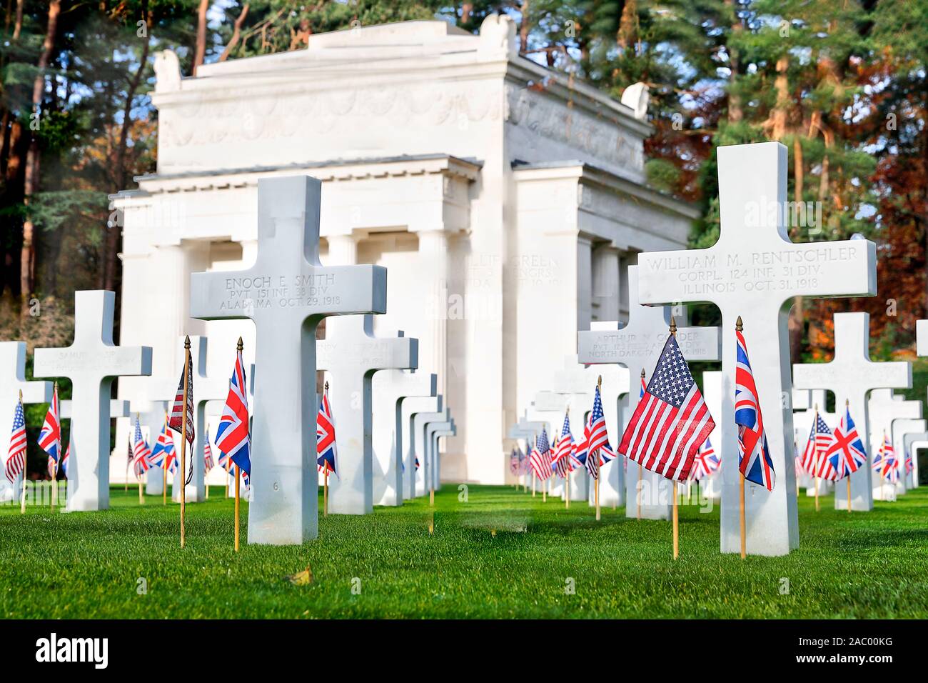 American Military Cemetery Brookwood UK for Remembrance Sunday 2019 with national flags at headstones Stock Photo