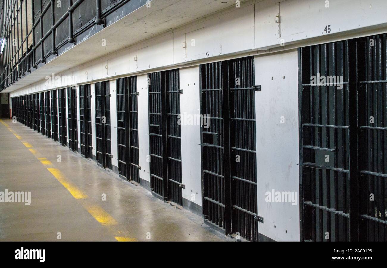 rows of vintage jail cells in historic Montana State Prison at Deer Lodge Stock Photo