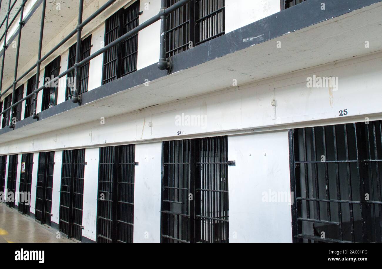 rows of vintage jail cells in historic Montana State Prison at Deer Lodge Stock Photo