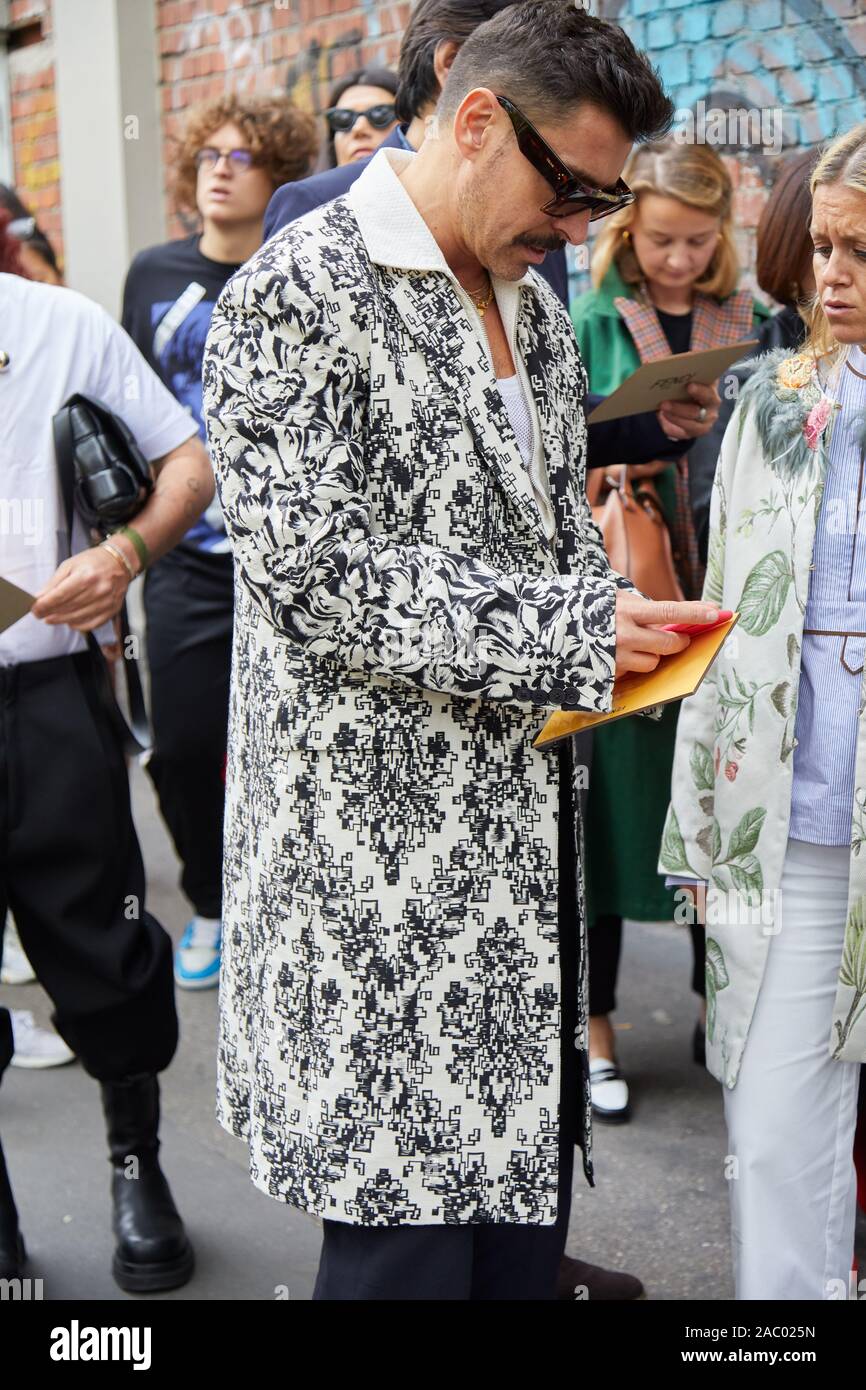 White shirt black coat hires stock photography and images Alamy