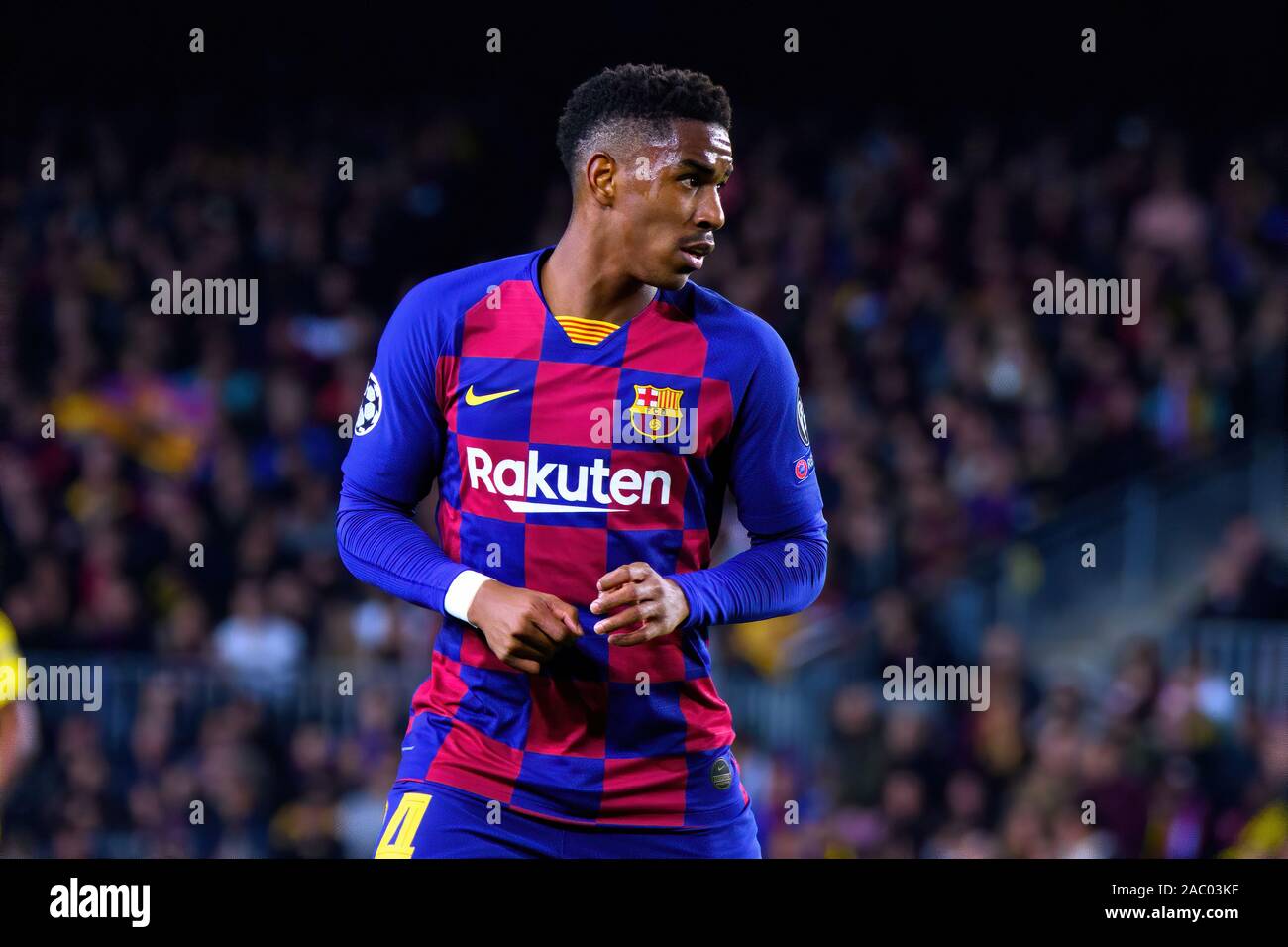 BARCELONA - NOV 27: Junior Firpo plays at the Champions League match between FC Barcelona and Borussia Dortmund at the Camp Nou Stadium on November 27 Stock Photo
