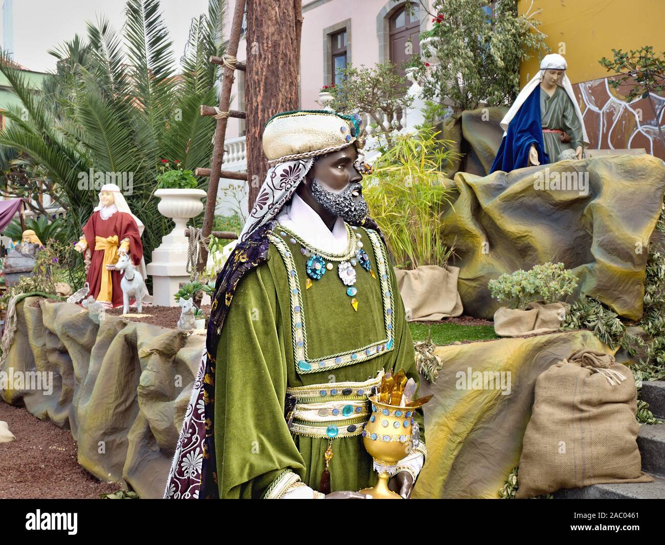 Life-size crib figure in the magnificent green velvet robe, the Holy King Kaspar , one of the three holy kings, Kaspar, the black king, was the king o Stock Photo