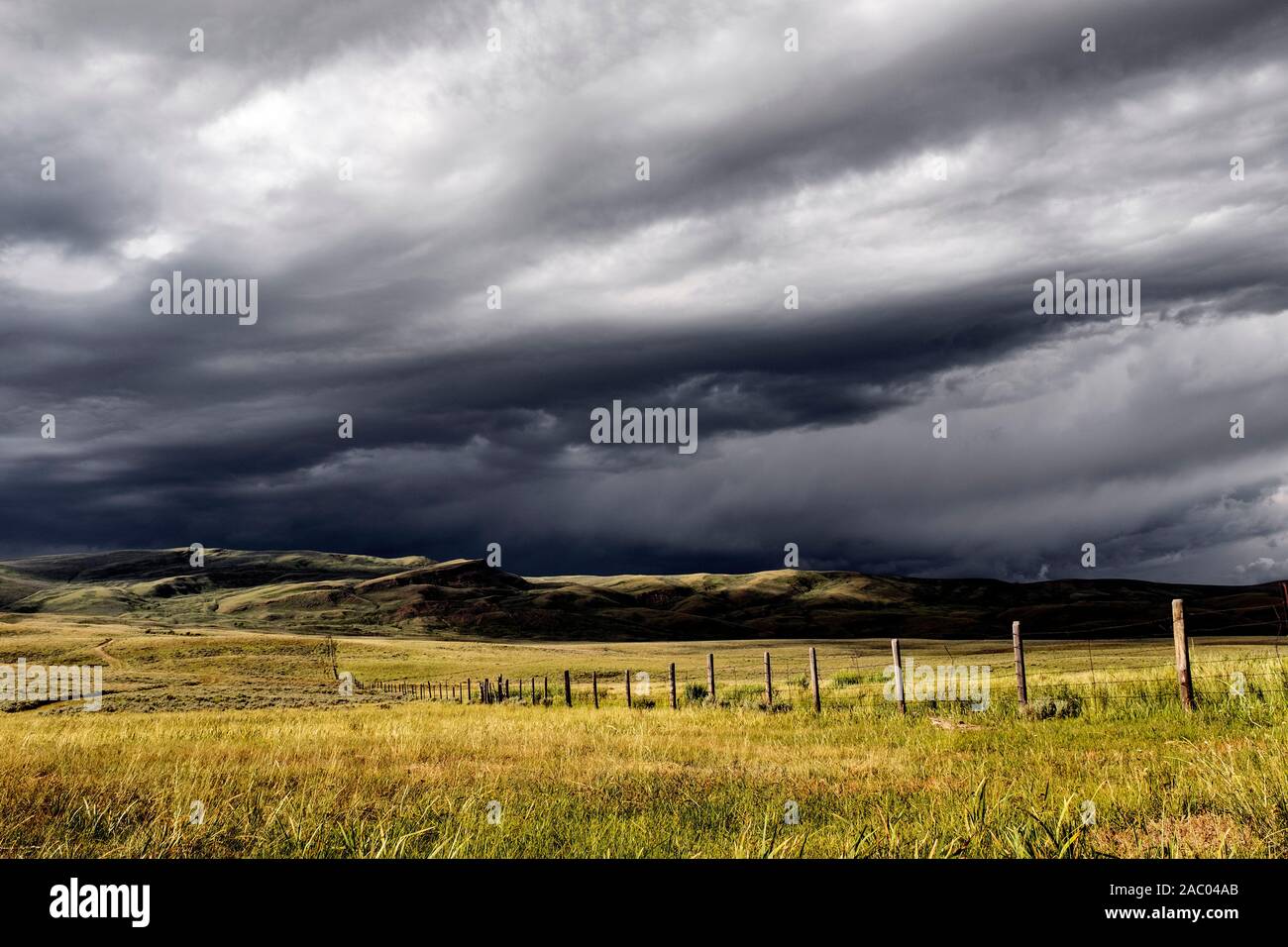 MT00324-00...MONTANA - Storm clouds near Lima Reservoir along the Great Divide Mountain Bike Route Stock Photo