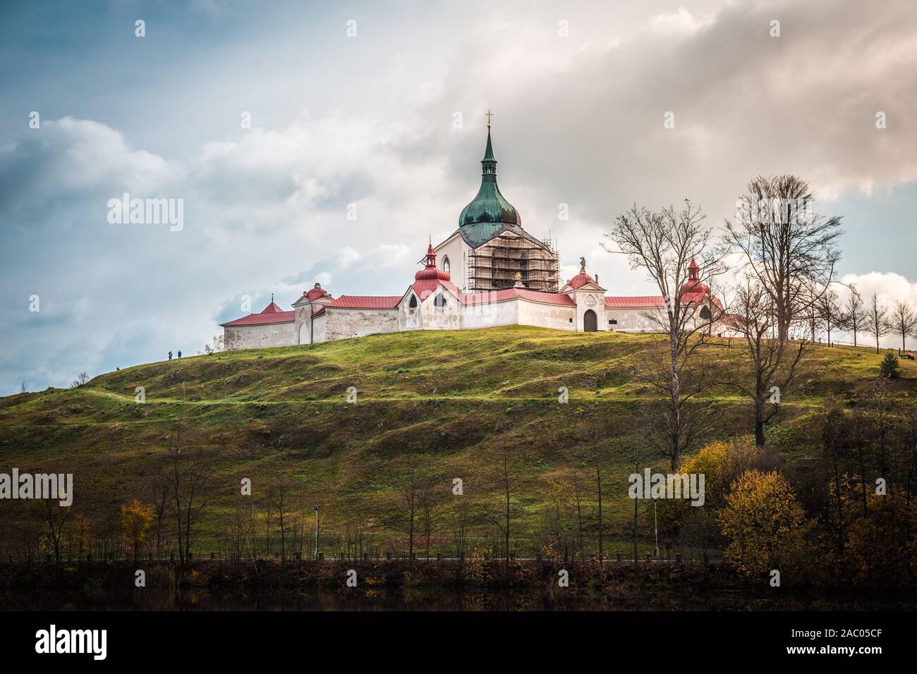 The pilgrimag church on Zelena Hora - Green Hill - Monument UNESCO. St. Jan Nepomucky Church panorama in autumn scene with reflection in the lake Stock Photo