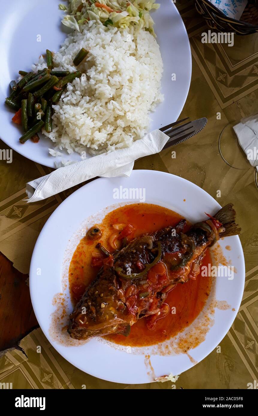 Blackened fish, rice and cassava leaves: A delicious local meal in ...