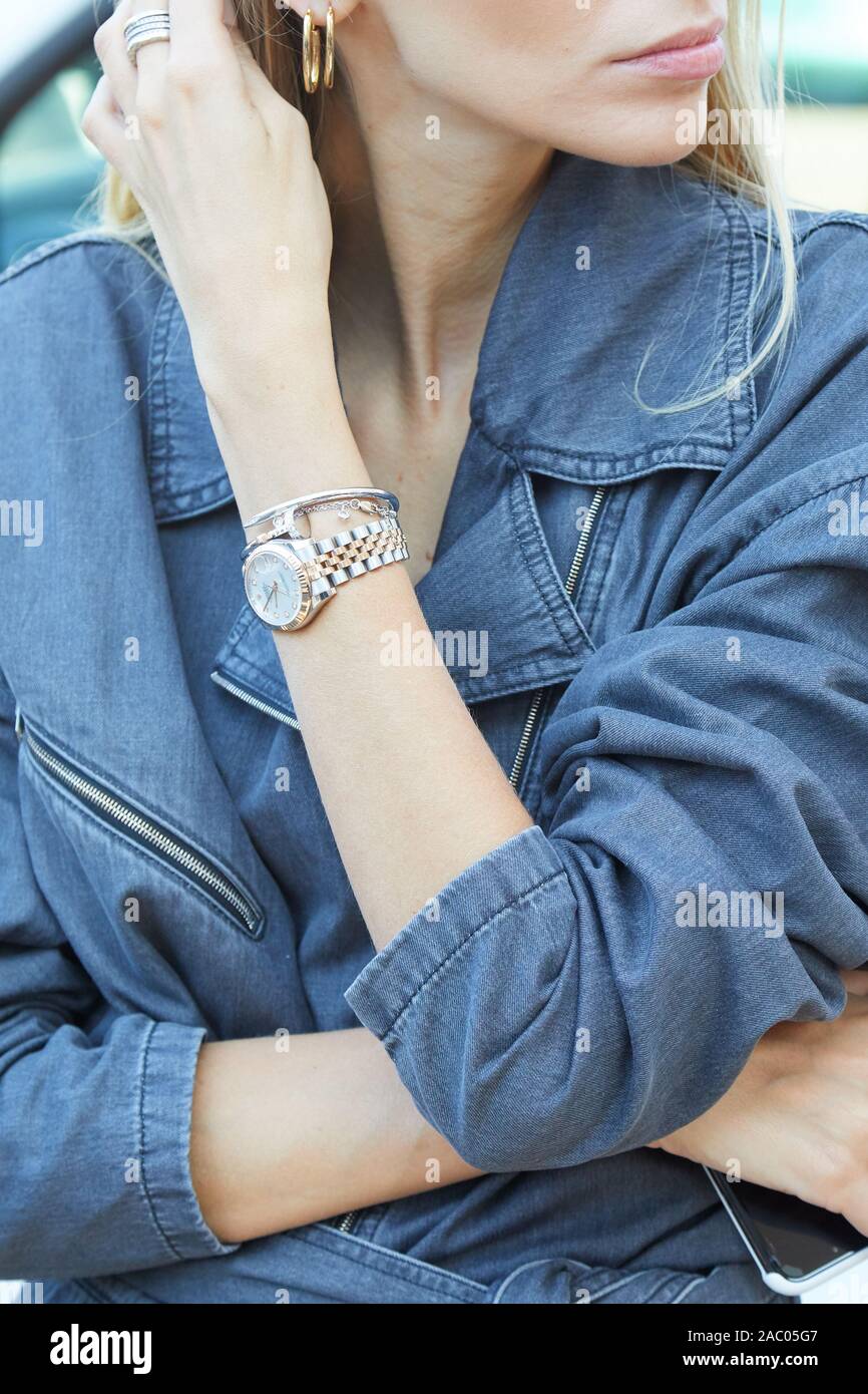 MILAN, ITALY - SEPTEMBER 19, 2019: Woman with Rolex Datejust watch and blue  denim overalls before Luisa Beccaria fashion show, Milan Fashion Week stre  Stock Photo - Alamy