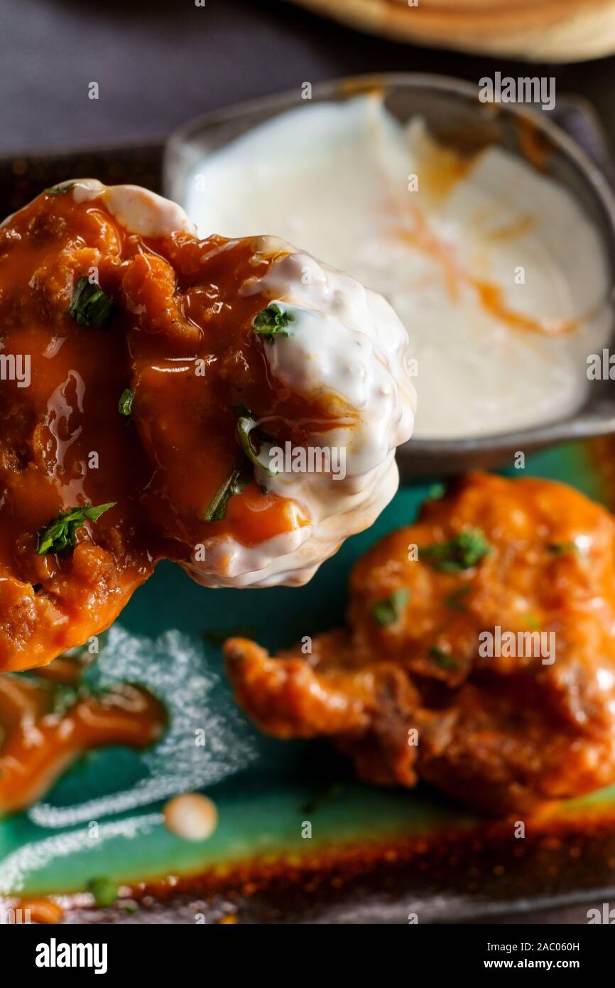 Download Hot And Spicy Buffalo Wings With Blue Cheese Dipping Sauce Stock Photo Alamy PSD Mockup Templates