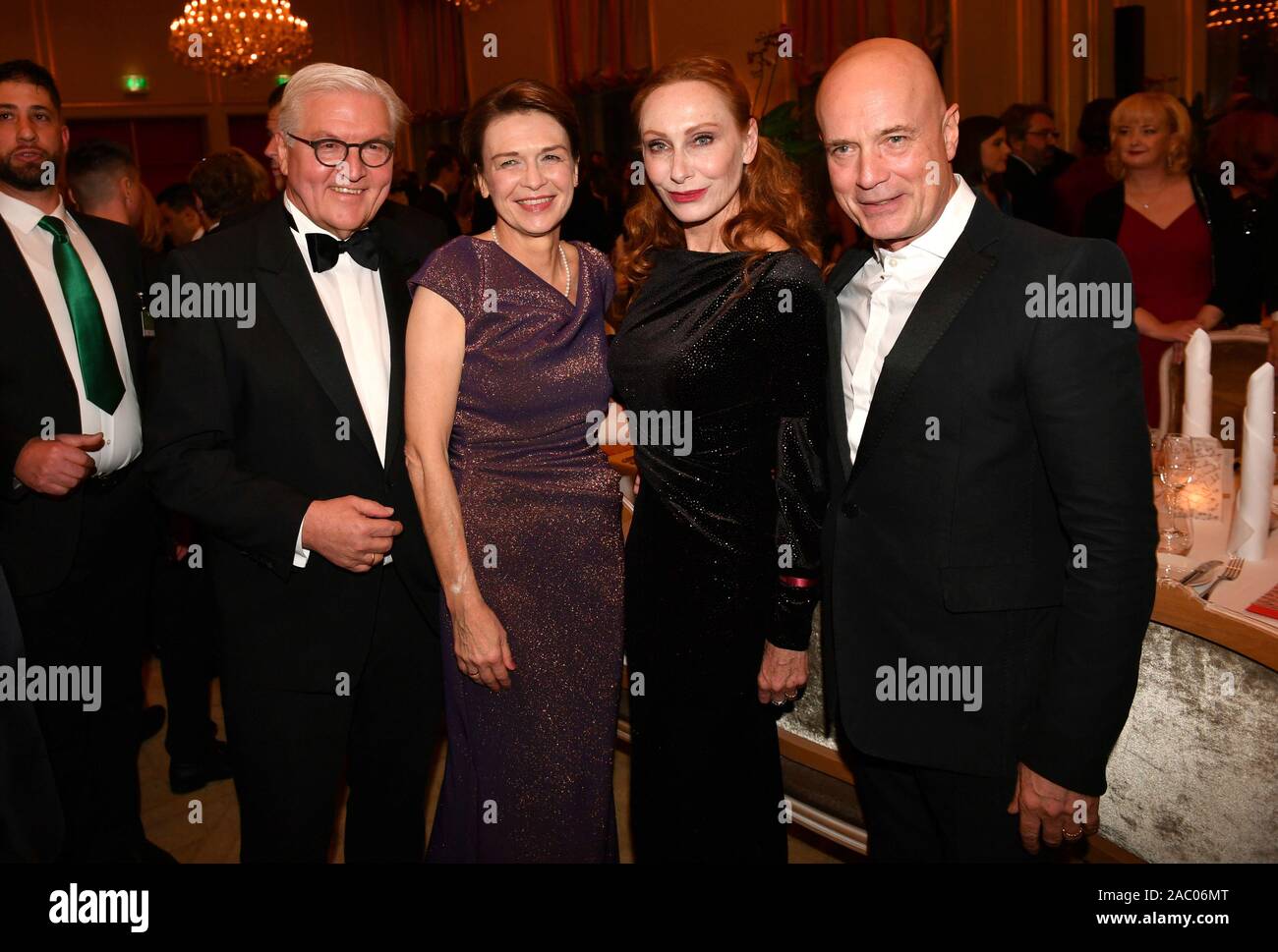 Berlin, Germany. 29th Nov, 2019. Federal President Frank-Walter Steinmeier and his wife Elke Büdenbender are standing next to actress Andrea Sawatzki (2nd from right) and her husband actor Christian Berkel (right) at the 68th Federal Press Ball under the motto "Change" at the Hotel Adlon. Credit: Jens Kalaene/dpa-Zentralbild/POOL/dpa/Alamy Live News Stock Photo