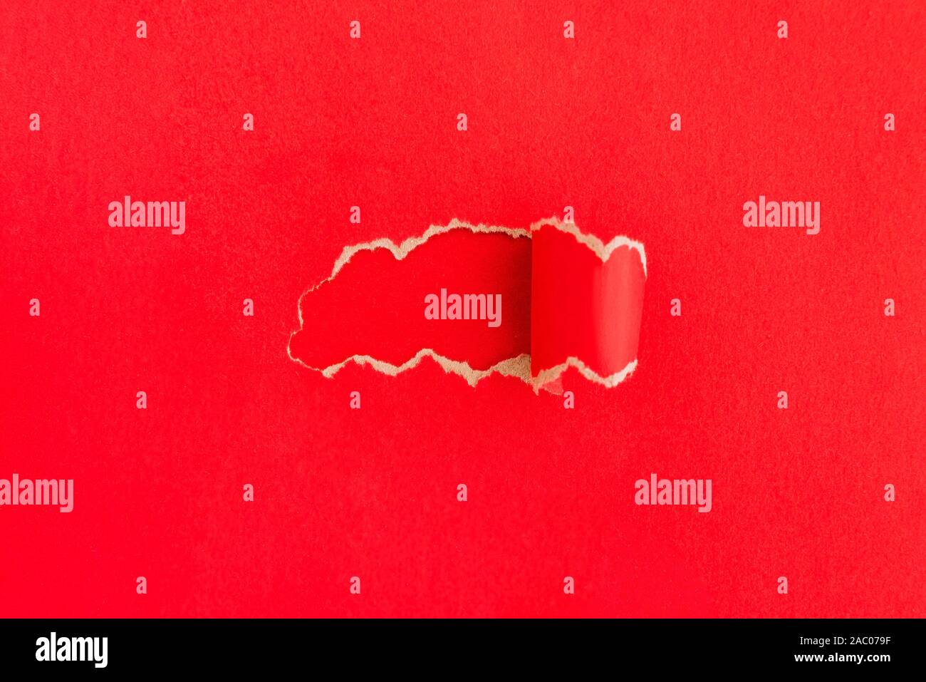 Torn red paper with space for your text message. Mockup. Stock Photo