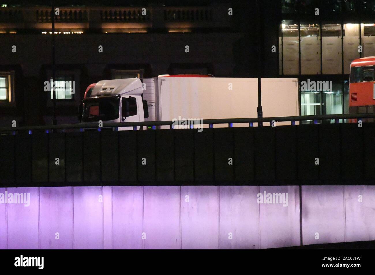 A white lorry on London Bridge in central London after a terrorist wearing a fake suicide vest who went on a knife rampage was shot dead by police. Stock Photo