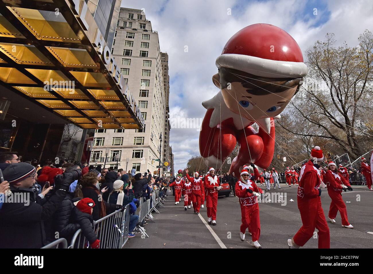 New York, USA. 28th Nov, 2019. Elf On The Shelf balloon is pushed sideways by a gust of wind during the 93rd Annual Macy's Thanksgiving Day Parade in New York, NY, November 28, 2019. (Photo by Anthony Behar/Sipa USA) Alamy Live News Stock Photo