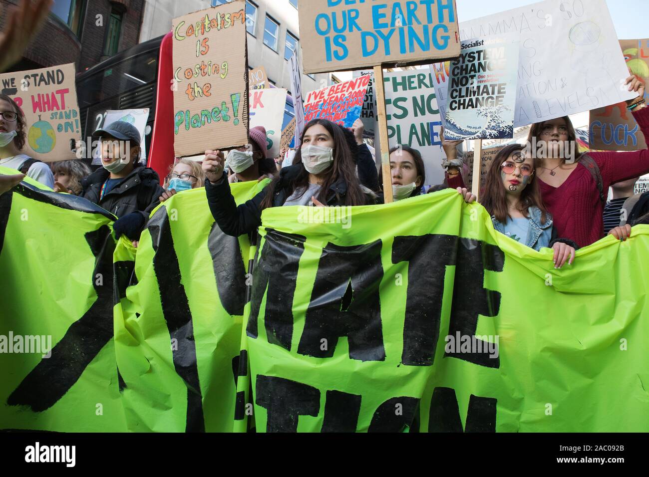 Westminster, London, UK. 29 November 2019. Hundreds of school children turn out for a global Climate Emergency Strike in London organised by the UK Student Climate Network. Police diverts the protesters in Regent Street to prevent them reaching Oxford Circus. Stock Photo
