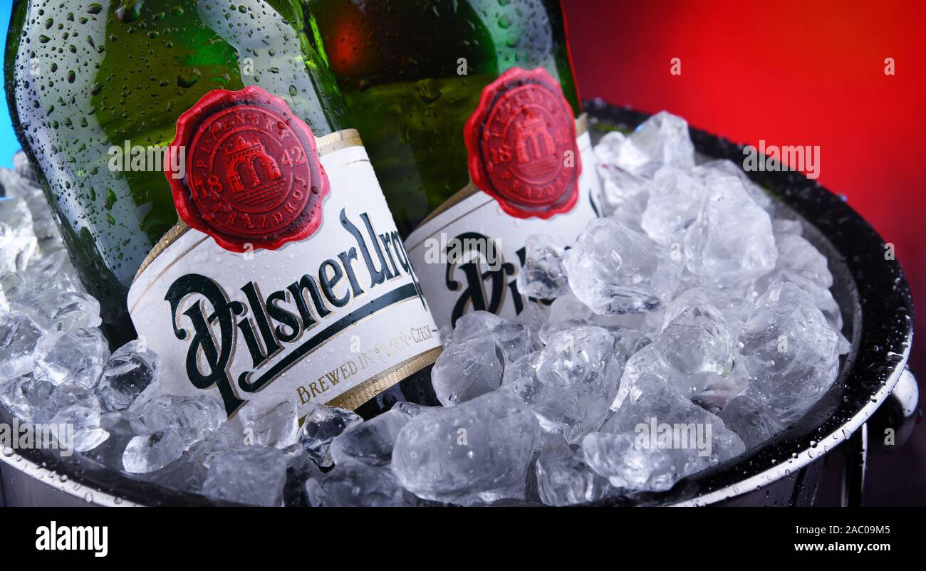 POZNAN, POL - NOV 8, 2019: Bottles of Plzensky Prazdroj, the first pilsner beer in the world, known better by its German name Pilsner Urquell Stock Photo