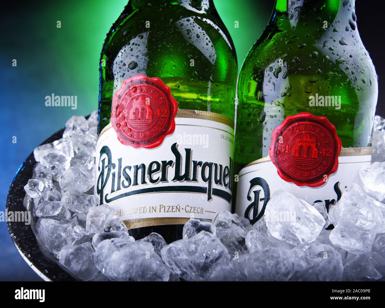 POZNAN, POL - NOV 8, 2019: Bottles of Plzensky Prazdroj, the first pilsner beer in the world, known better by its German name Pilsner Urquell Stock Photo