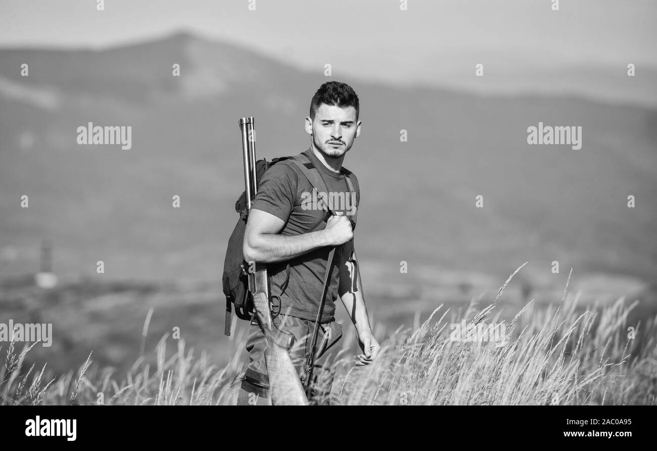 Never army forces. sniper reach target mountain. muscular man