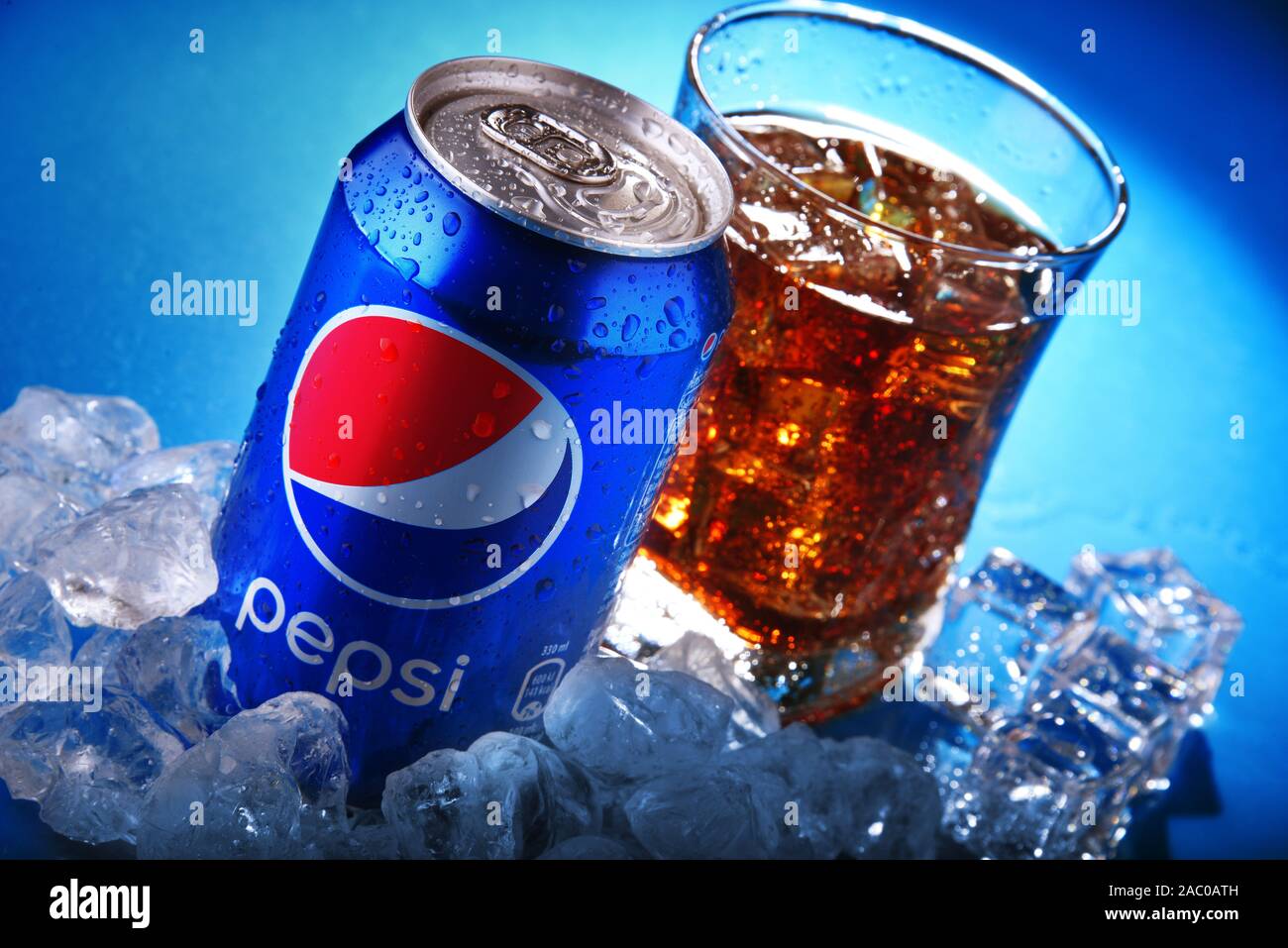 POZNAN, POL - NOV 22, 2019: Can and glass of Pepsi, a carbonated soft drink produced and manufactured by PepsiCo. The beverage was created and develop Stock Photo
