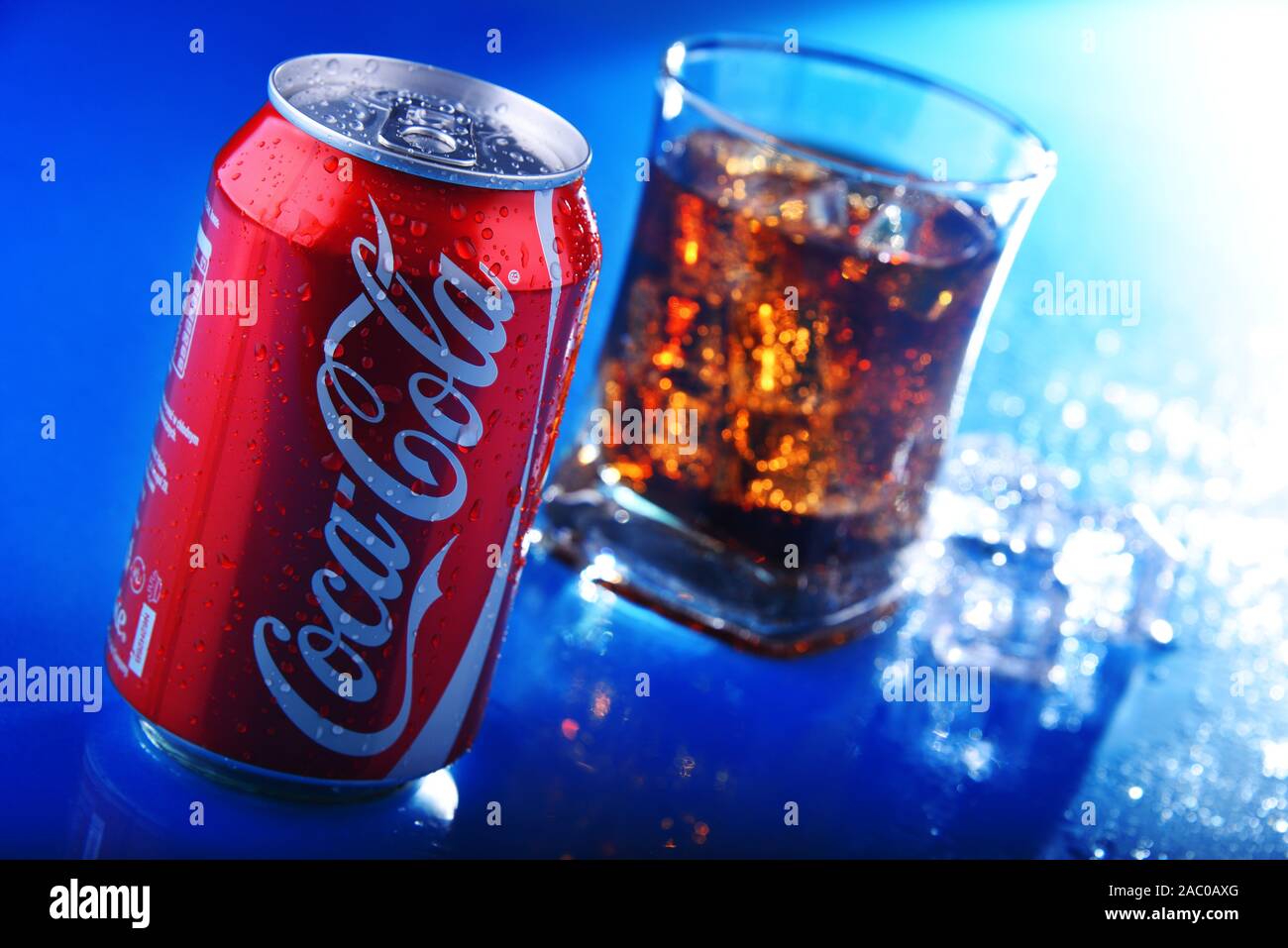 POZNAN, POL - NOV 22, 2019: Can and glass of Coca-Cola, a carbonated soft drink manufactured by The Coca-Cola Company headquartered in Atlanta, Georgi Stock Photo