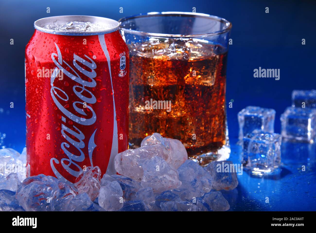 POZNAN, POL - NOV 22, 2019: Can and glass of Coca-Cola, a carbonated soft drink manufactured by The Coca-Cola Company headquartered in Atlanta, Georgi Stock Photo